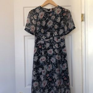 Black floral print short sleeve midi dress.